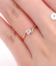 18KGP   Rose Gold Stamped Solitaire Diamond Bypass Ring