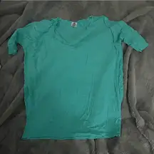 Anges & Dora teal Tee size large