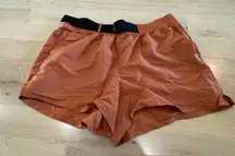 FLX Women's Buckle-Front Twill Woven Active Shorts rust orange size large