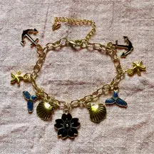 Gold Charm Bracelet with Nautical and Floral Accents