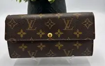 Louis Vuitton 
Vintage Sarah Wallet Monogram Canvas