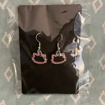 Hello Kitty Earrings. NWOT Kitty heads with pink stones.