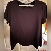 New, never worn Chico’s brand black top. Size 3.