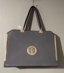 Gold and Gray Satchel with Structured Design and Medallion