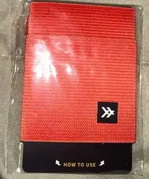 Thread Wallets Red Thread vertical wallet. New In package holds cardsID & attaches to key ring