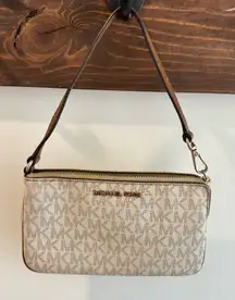 Michael Kors Jet Set Wristlet in Vanilla Signature Logo Print