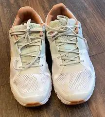 On Running White and Tan Sneakers