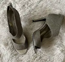 Women’s silver heels, size 8 1/2M