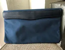 Vintage navy blue and black clutch with a outer trim