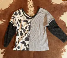 Cow print top from  size medium