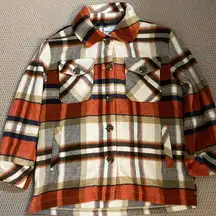 Jeans flannel jacket size small.  Orange, navy, beige and ivory plaid.