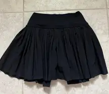 black pleated skort