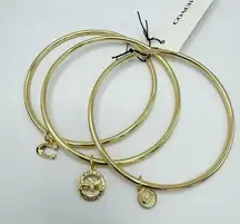 Coach gold 3 piece bangle set with charms NEW horse & carriage Charm