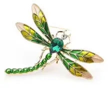 Brooch dragonfly in shades of green adorned with sparkly crystals