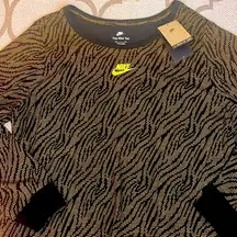 The Nike Tee 100% cotton long sleeve black gold design shirt