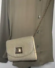 La ragale Golden color clutch