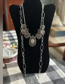 Two costume necklaces silver tone as shown, Cookie Lee (long one) preowned