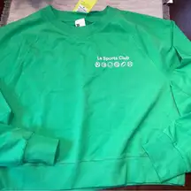 New size medium woman’s all in motion crew neck sweater