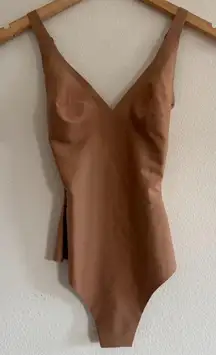 Skims Body Unlined Plunge Thong Bodysuit in Sienna, Size XS