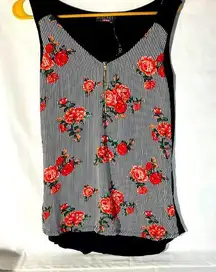 Discreet Women’s blouse NWT sleeveless.            Size L