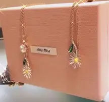 Miu Miu gold and gingham Daisy necklace and bracelet set Prada owned​​​​​​