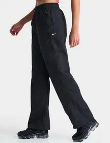 NWT! Women’s Nike black old school 100% nylon windbreaker pants Small $90