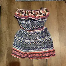 Looking for something stylish to wear to that concert or music fest coming up? Look no farther. Chic boho style romper with colorful and fun floral and geometric designs. Ideal for casual outings, the beach, and fun times with friends. Jolt Brand Romper. Juniors size small. 