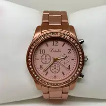 Xclusive rose gold tone women watch 37mm round rhinestones quartz 7” running