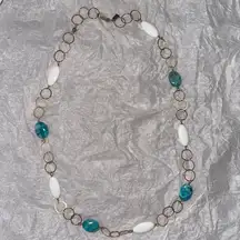 Gold long necklace with white and turquoise beads