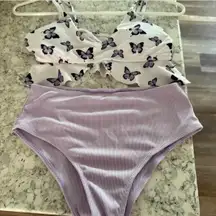 Lavender high-waisted bikini bottoms and white bikini top with butterfly print #beachyvibes