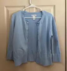 blue button-up sweater