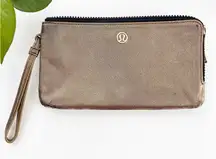 Lululemon Double Up Pouch Wristlet in a Metallic Gold