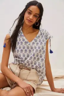 Anthropologie gauzy floral tassel tie short sleeve blouse