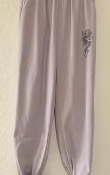 ROMWE Light Purple Track Pants with Dragon Print