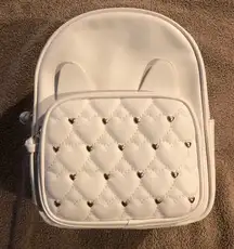 Under One Sky small backpack. New.