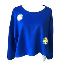 SugarHigh Clothing Blue crop sweatshirt with yellow smiley faces