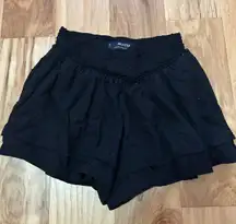 Black Textured Skirt With Shorts Under.