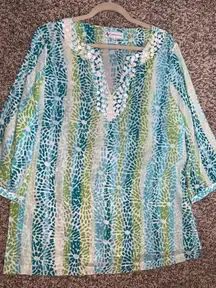 Adrienne Vittadini: A stylish Tunic with beaded accents and a flattering V-neck.