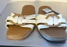Universal thread with tags slip on sandals. White with beautiful tan size 6 1/2.
