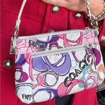 Authentic COACH 1941 POPPY shimmery Leather/thick Cotton zip closure wristlet