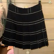 Plaid, pleated skirt from . Sunday Best brand.