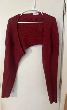 red sweater shrug
