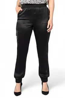 LOGO by Lori Goldstein Regular Satin Cargo Pant with Rib Waistband Size M QVC ASOT Reg $85 NWT  Adjust Text Size: Description Best dressed is in your future when you arrive wearing these sassy satin cargo pants. The casual jogger-style cargos are ideal for any RSVP while the sleek satin fabric elevates the mood to party mode. Such a saucy boss! From LOGO by Lori Goldstein®. Features: pull-on jogger style, ribbed elastic waistband, front pockets, side leg cargo pockets, elastic leg cuffs Rise: at the waist Fit: semi-fitted; follows the lines of the body with added wearing ease Leg Shape: tapered leg; tapers from thigh to narrow opening Inseam: missy/plus inseam 29" Content: 97% polyester/3% spandex Care: machine wash, tumble dry Imported