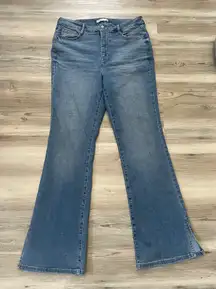 size 14, bootcut jeans, waist is 16 with stretch to 19, length is 30, NWOT