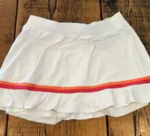 Tail athletic skirt with attached shorts   Medium white with pink and orange‎