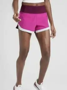 ATHLETA running free color block athletic shorts size Medium lined inside pink
