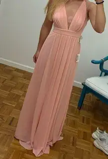 Light pink/blush flowy prom dress. Or formal maxi dress.