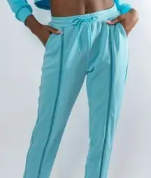 Waisted blue zipper track pants