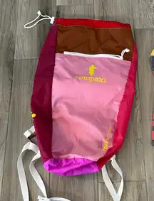 Cotopaxi day pack with matching socks