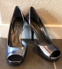 Only worn a few times  pewter heels. Mint condition. Sz 8